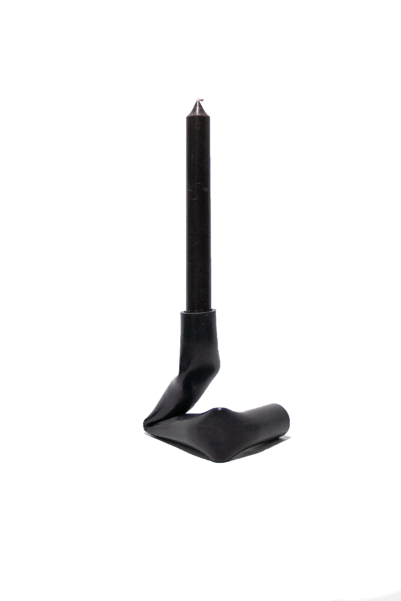A candle holder created by Jannis Schäfer Studio, made from upcycled PVC tube. The design features a unique, twisted form with two cylindrical openings for candles. This transformed and reclaimed material piece is part of a series of derivative designs.